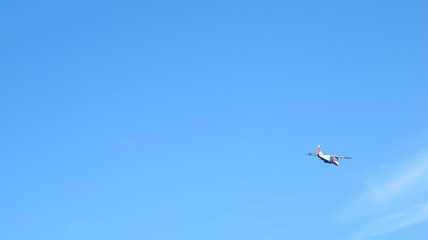 A small plane in the sky
