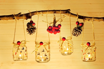 Christmas new year  background decorating  with candles on recycled glass jars