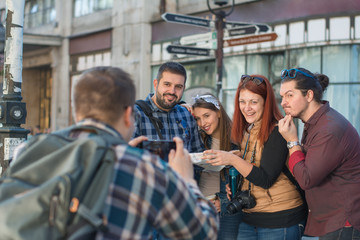 Group of tourists sightseeing the city