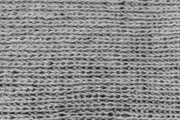 White natural texture of knitted wool textile material background. White cotton fabric woven canvas texture