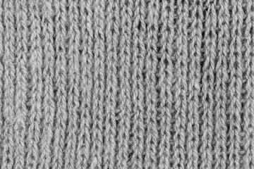 White natural texture of knitted wool textile material background. White cotton fabric woven canvas texture