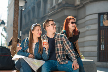 Fototapeta premium Young tourists exploring the city