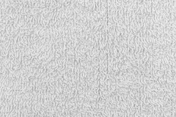 White natural texture of knitted wool textile material background. White cotton fabric woven canvas texture