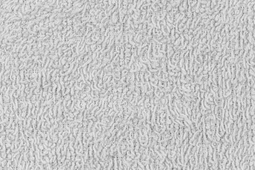 White natural texture of knitted wool textile material background. White cotton fabric woven canvas texture