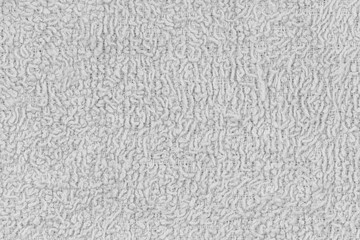 White natural texture of knitted wool textile material background. White cotton fabric woven canvas texture