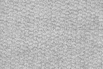 White natural texture of knitted wool textile material background. White cotton fabric woven canvas texture