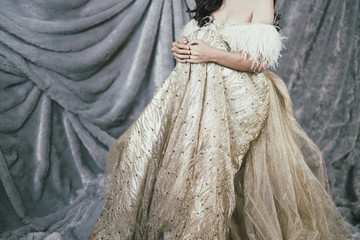 elegant woman in golden yellow long gown evening dress