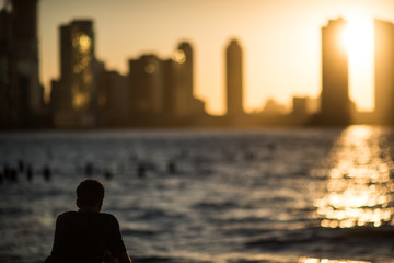 Man looking at sunset in new york