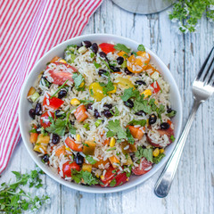 Rice Vegan Vegetable Salad with Fresh herbs and Beans