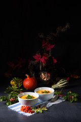 Delicious pumpkin soup with croutons and coconut milk