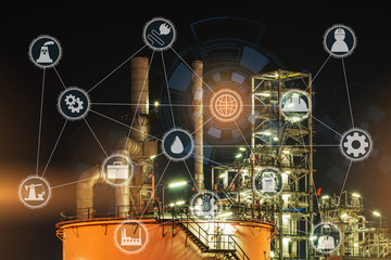 Aerial view or top view night light oil terminal is industrial facility for storage of oil and petrochemical for transport and business transportation. icons oil refinery and technology concept.