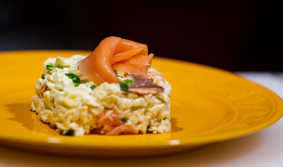 Omelet with salmon and green onion. Fried eggs. Sea fish. Organic food. Mediterranean diet. Cook in the restaurant kitchen