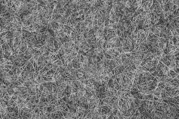 Extruded hair felt closeup background texture. sheep wool for felt boots