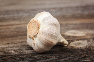 Fresh garlic fruit on a wooden board