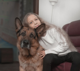 portrait of cute schoolgirl girl with her dog