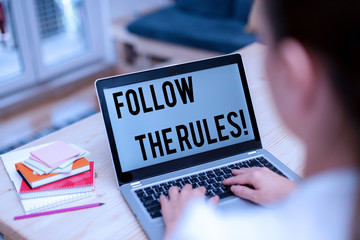Text sign showing Follow The Rules. Business photo showcasing go with regulations governing conduct...