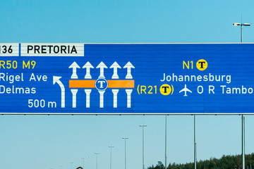 Fototapeta premium overhead road sign on highway