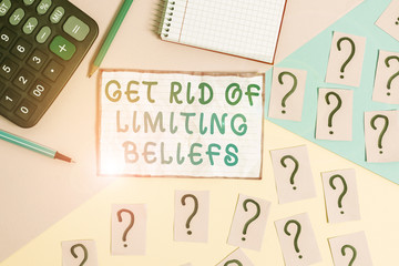 Handwriting text Get Rid Of Limiting Beliefs. Conceptual photo remove negative beliefs and think positively Mathematics stuff and writing equipment above pastel colours background