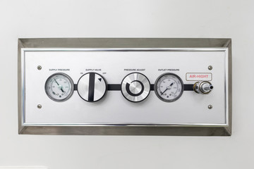 Nitrogen control panel on wall of emergency room.