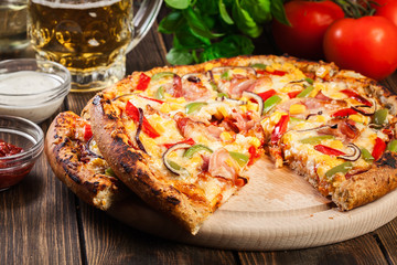 Homemade pizza with bacon, paprika and corn