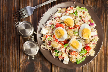 Fresh salad with couscous and eggs