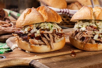 Homemade pulled pork burger with coleslaw salad