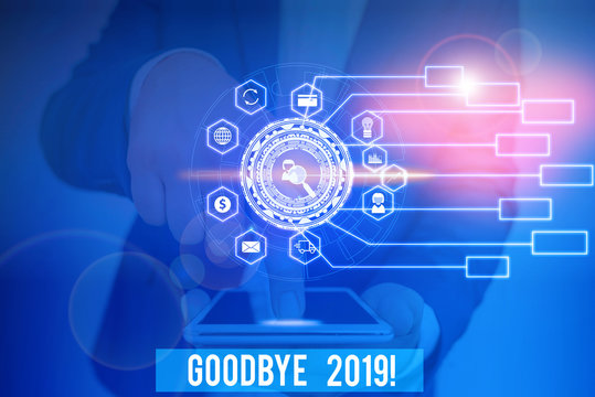 Word writing text Goodbye 2019. Business photo showcasing express good wishes when parting or at the end of last year Picture photo system network scheme modern technology smart device