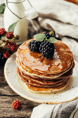 Stack of pancakes with fresh blackberry, Close up.