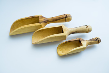 Traditional wood object wooden scoop or spoon isolated on a white background from various angle and top view