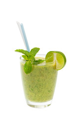 Glass of green healthy shake of lime, kiwi, mint and apple with straw isolated at white background. Concept of vegan superfood and healthy lifestyle.