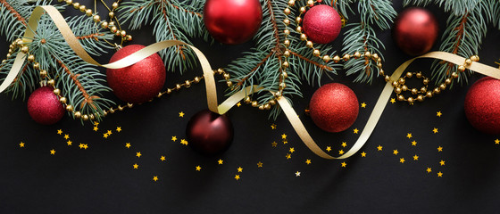 christmas decoration background with red balls and golden stars
