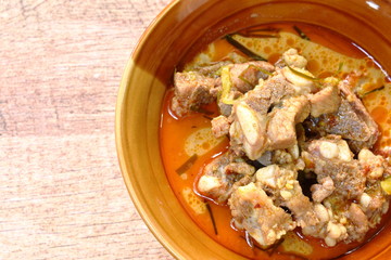 boiled pork bone with coconut milk curry on bowl