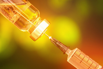 Syringe with a vaccine. Medical flu shot concept. injection bottle for medical glass vials