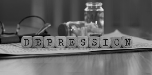 Word DEPRESSION composed of wooden dices. - obrazy, fototapety, plakaty