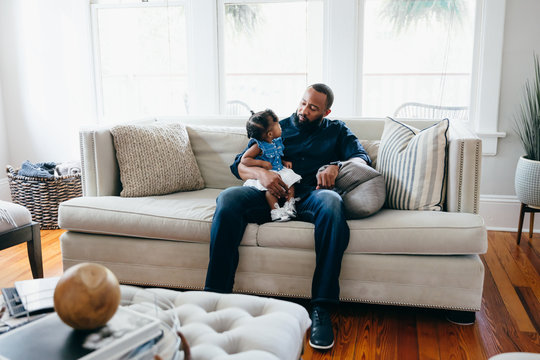 Father and daughter looking at each other