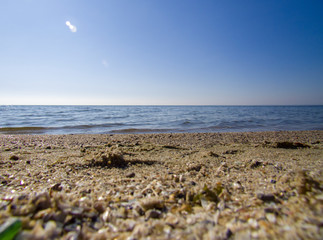 Sea and beach in sun rays