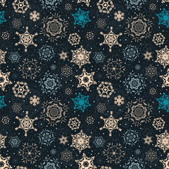 Winter seamless pattern with colorful snowflakes on a dark background. Vector illustration.