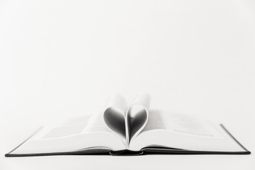 An open book on a table.