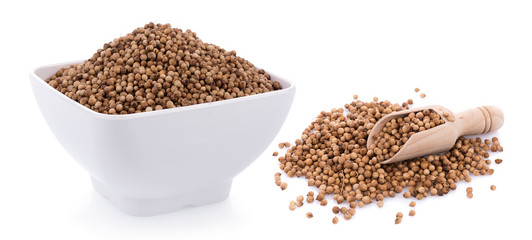coriander seeds on white background
