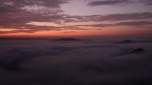 Time Lapse video sunrise on the  mountains and mist