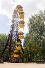 Abandoned amusement park. ferris wheel in an amusement park in Pripyat. Unhappy childhood.