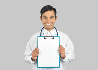 doctor with stethoscope working holding a clipboard on white background. copy space.