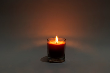 candle in a glass