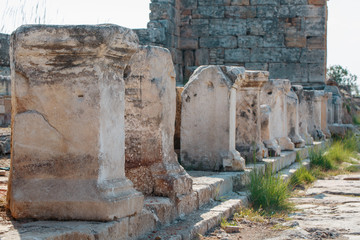 Columns of elements of buildings, parts of the ruins and antiquity of the ancient. City of Hierapolis