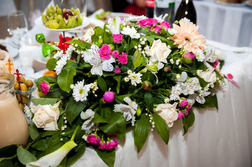 Wedding flowers concept. . Bright colors. Table decorations. Closeup.