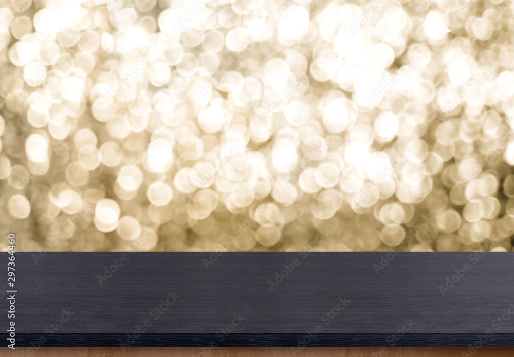 Poster empty old rustic black wood table top with blur sparkling gold bokeh background,panoramic banner for