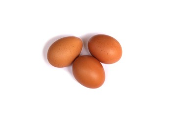 A group of brown eggs isolated on white background.