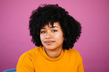 Portrait of an Afrolatina young woman in studio environment