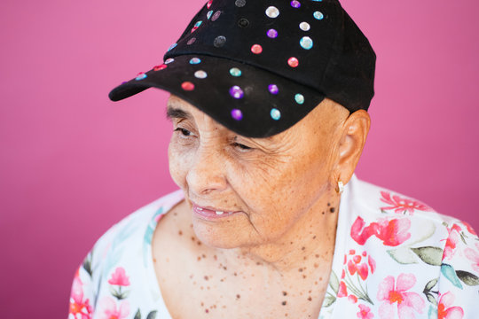 Portrait of Salvadorean/Latina grandmother in studio environment