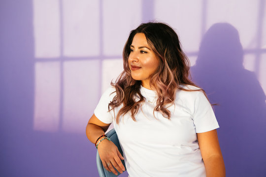 Portrait Of Young Latina Woman In Studio Environment